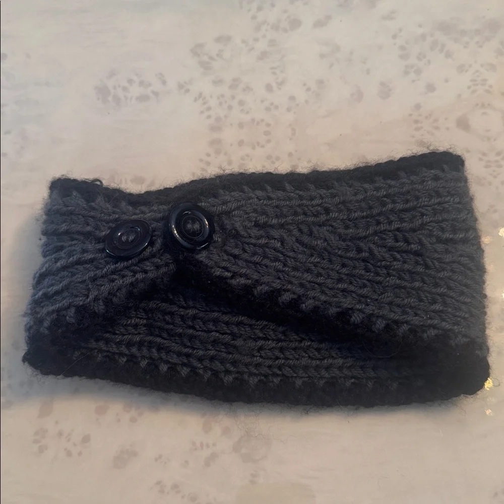 Elegant Black Knit Headband with Floral Accents